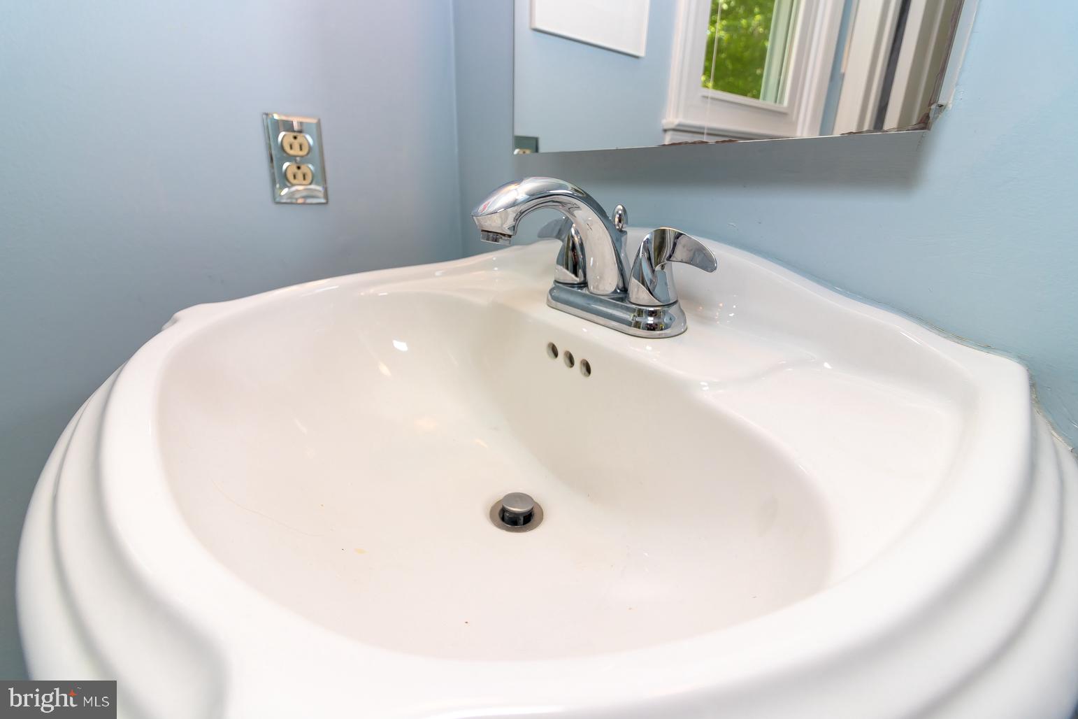 59 Tindall Road Trenton, NJ 08691 - Photo 57 of 76 a close view of sink and tap