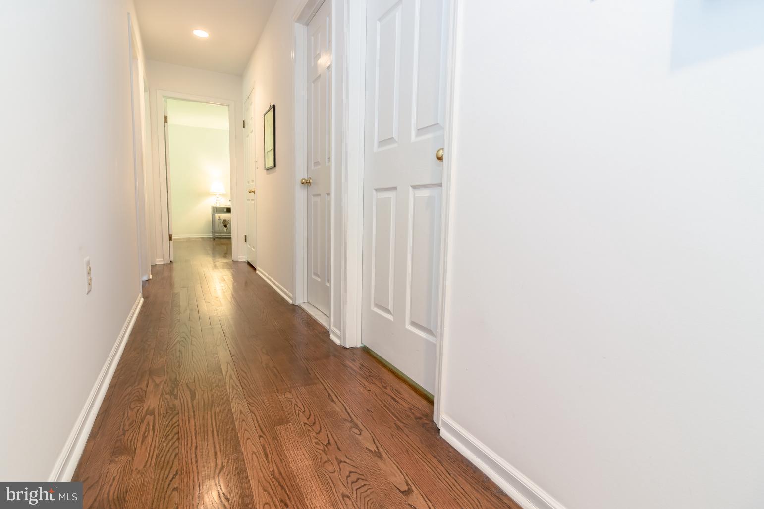 59 Tindall Road Trenton, NJ 08691 - Photo 60 of 76 a view of a hallway with wooden floor
