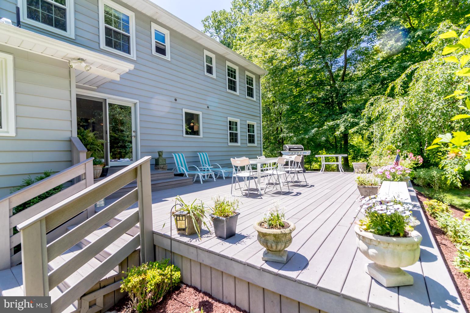 59 Tindall Road Trenton, NJ 08691 - Photo 64 of 76 a view of a patio with couches table and chairs and potted plants