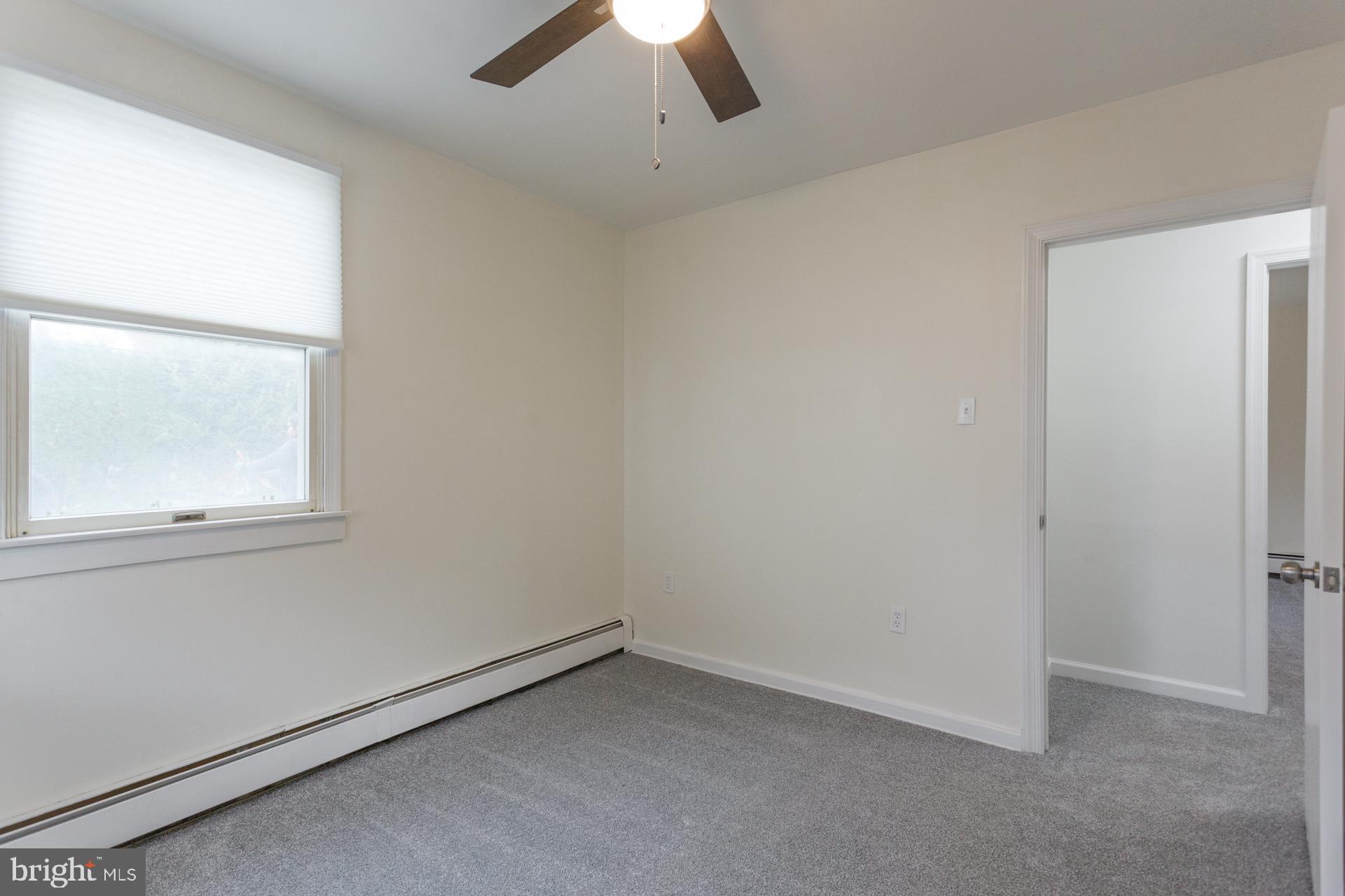 1007 Ripley Street Philadelphia, PA 19111 - Photo 18 of 27 an empty room with a window
