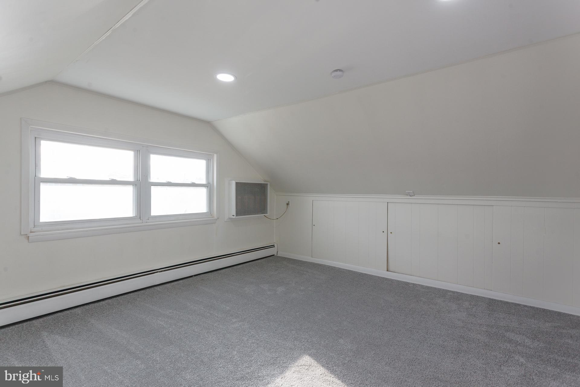 1007 Ripley Street Philadelphia, PA 19111 - Photo 24 of 27 an empty room with a window