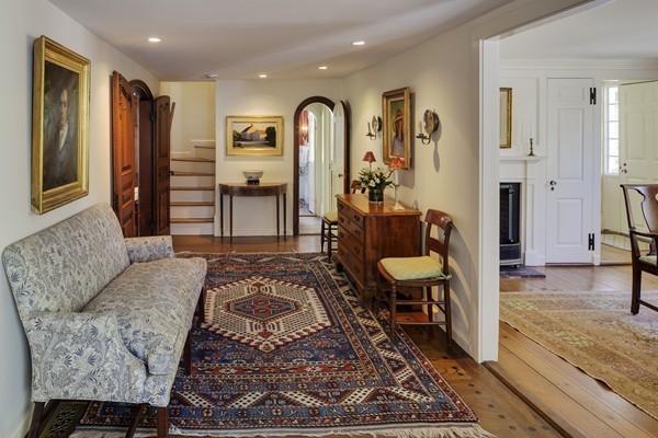 55 Willow Street Dover, MA 02030 - Photo 12 of 22 a living room with furniture and a rug