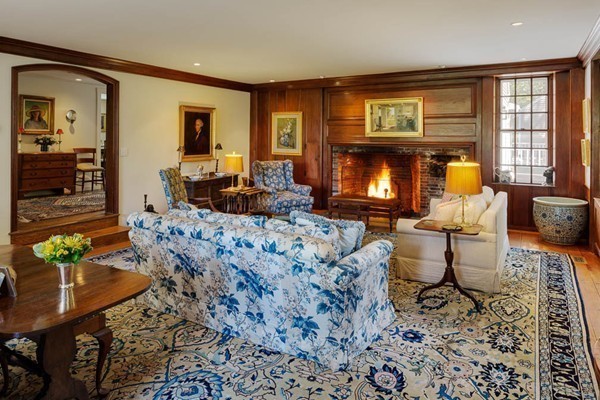 55 Willow Street Dover, MA 02030 - Photo 14 of 22 a living room with furniture and a fireplace