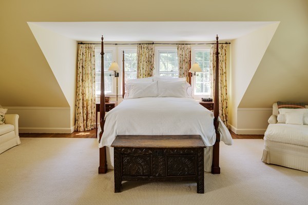 55 Willow Street Dover, MA 02030 - Photo 19 of 22 a bedroom with a bed and large window