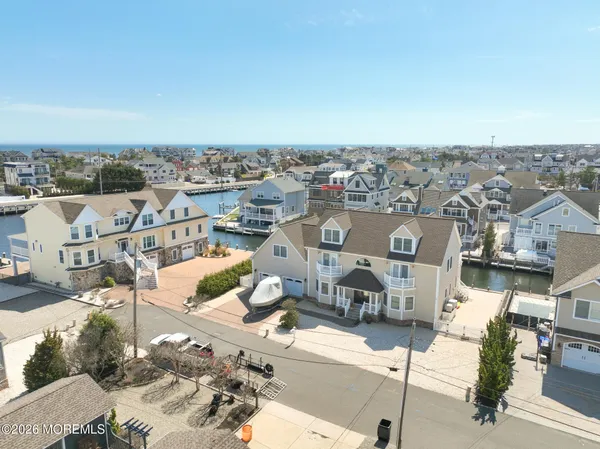 a view of a lake with building in front of it
