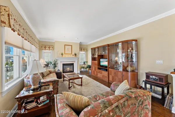 a kitchen with stainless steel appliances granite countertop a stove top oven a refrigerator a sink and dishwasher