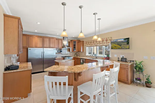 a bedroom with a large bed and closet