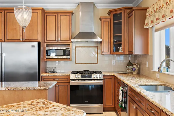 a view of a livingroom with wooden floor