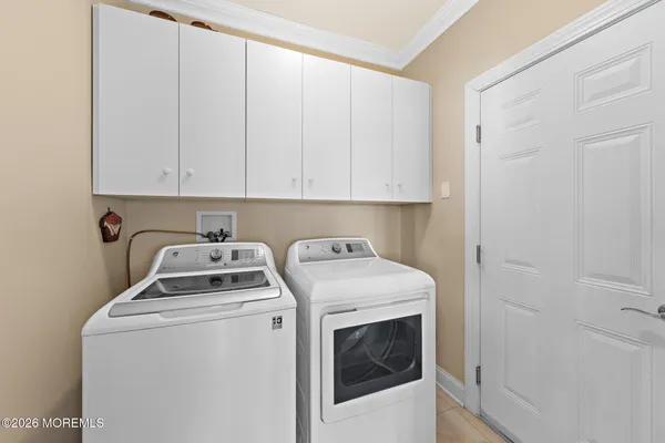 an aerial view of a house with a ocean view