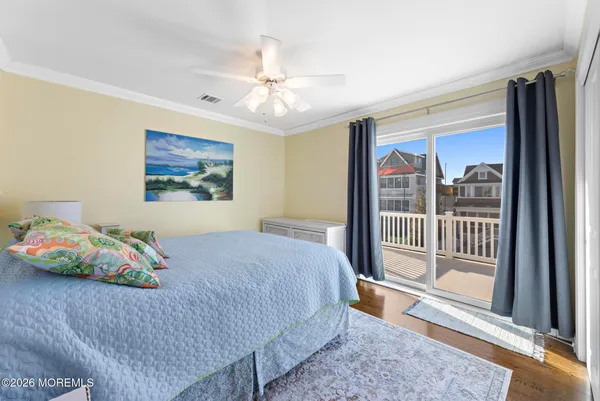 an aerial view of a house with a lake view