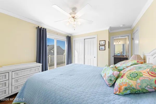 an aerial view of a house with a ocean view