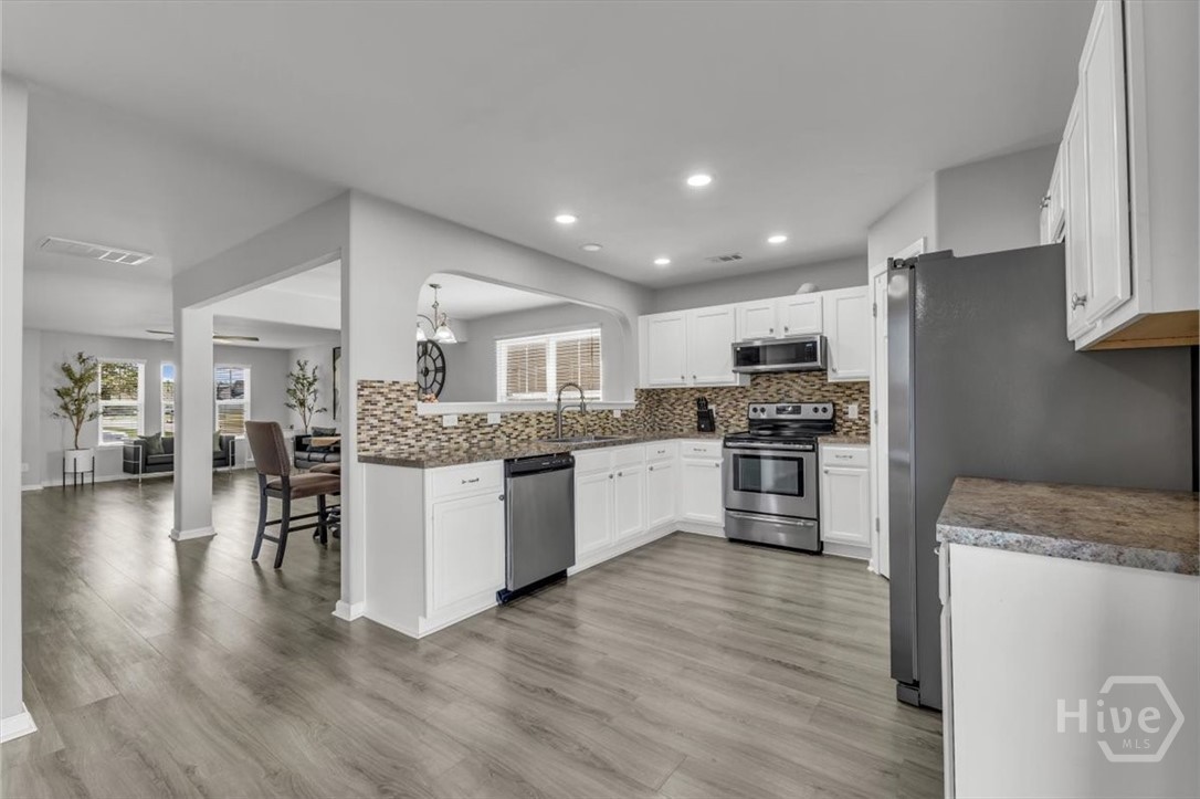 36 Hasty Point Road Port Wentworth, GA 31407 - Photo 19 of 70 KITCHEN VIEW WITH STAINLESS APPLIANCES WITH BACKSPLASH VIEW 2