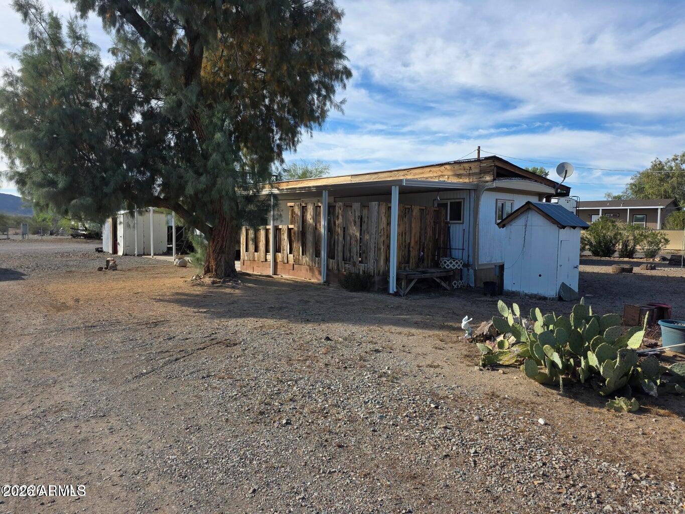 730 Tesota Quartzsite, AZ 85346 - Photo 1 of 15 a view of a house with a backyard