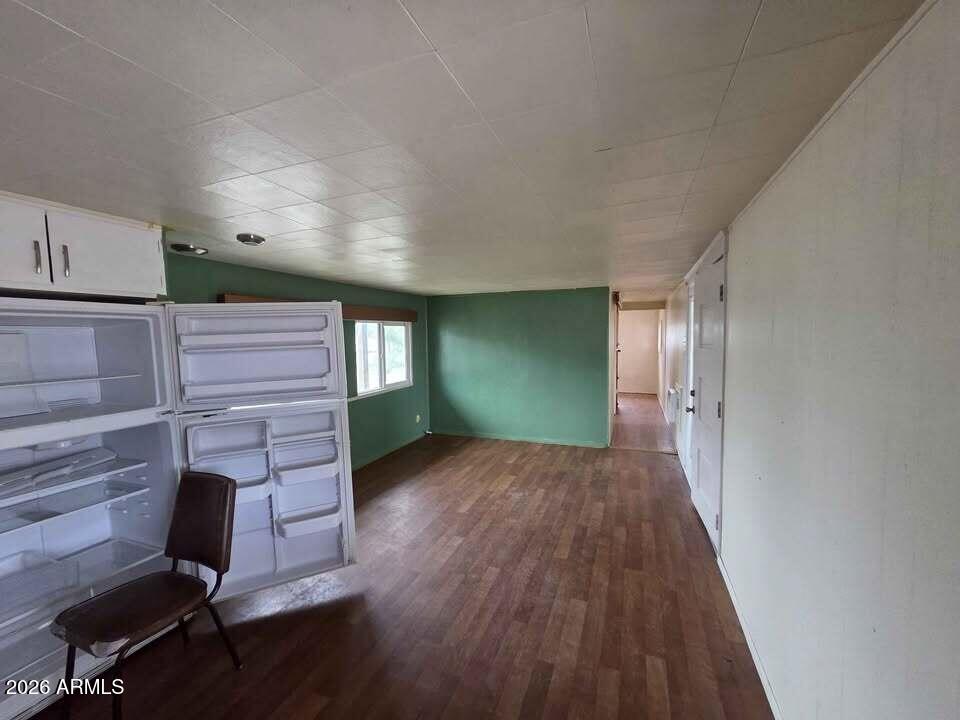 730 Tesota Quartzsite, AZ 85346 - Photo 14 of 15 a view of an empty room and fire place