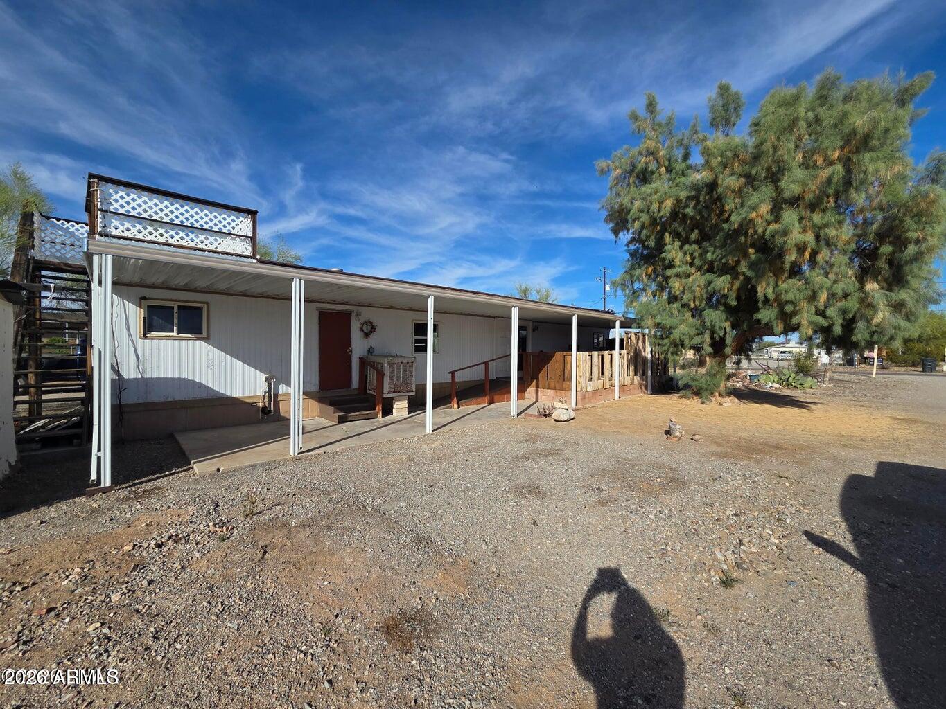 730 Tesota Quartzsite, AZ 85346 - Photo 7 of 15 a view of a house with a patio