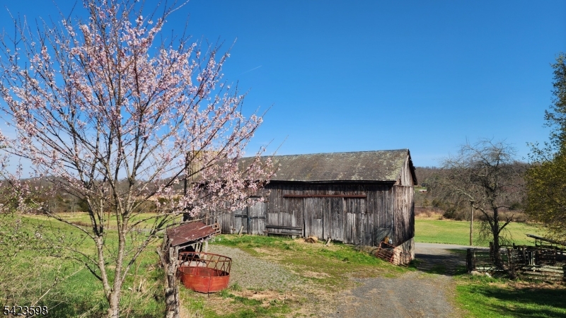 47 Snover Road Lafayette, NJ 07848 - Photo 13 of 33 a backyard of a house with lots of green space