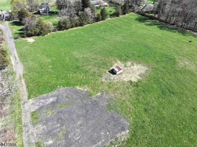 47 Snover Road Lafayette, NJ 07848 - Photo 17 of 33 a backyard of a house with a yard and outdoor seating