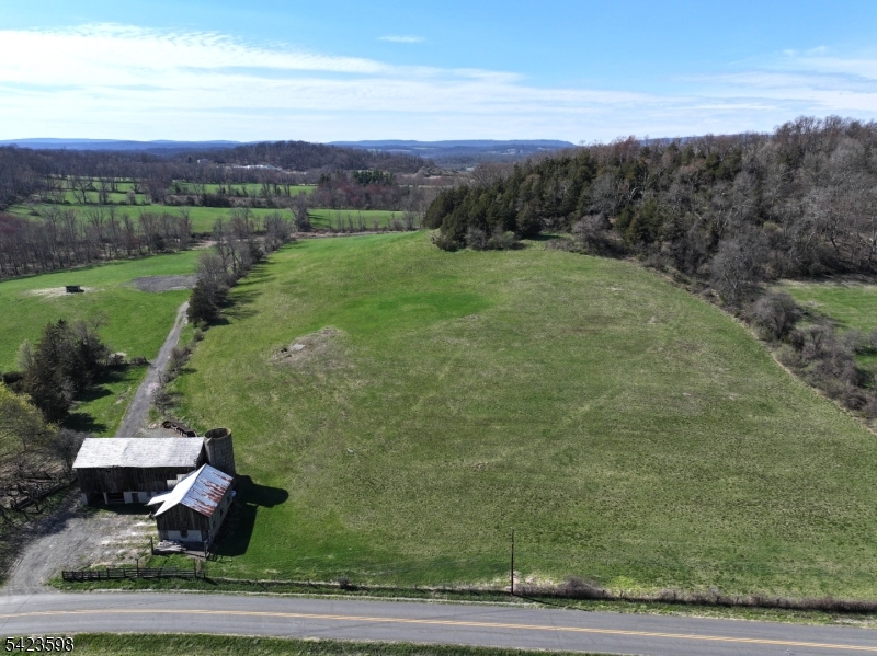 47 Snover Road Lafayette, NJ 07848 - Photo 3 of 33 a view of a yard with an outdoor space