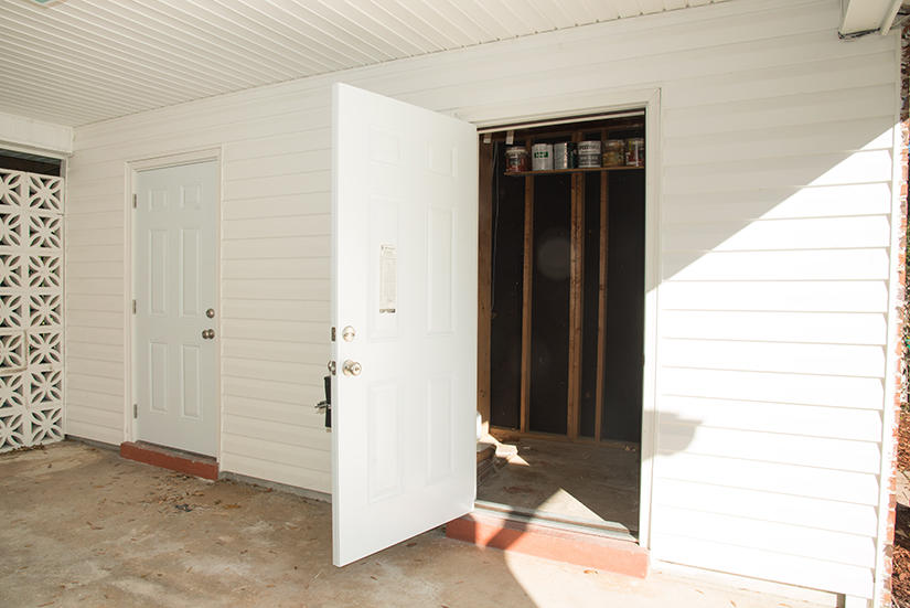 611 Lang Road Fort Walton Beach, FL 32547 - Photo 19 of 26 a view of a hallway with wooden door