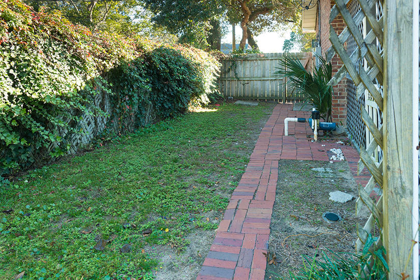 611 Lang Road Fort Walton Beach, FL 32547 - Photo 22 of 26 a backyard of a house with lots of green space