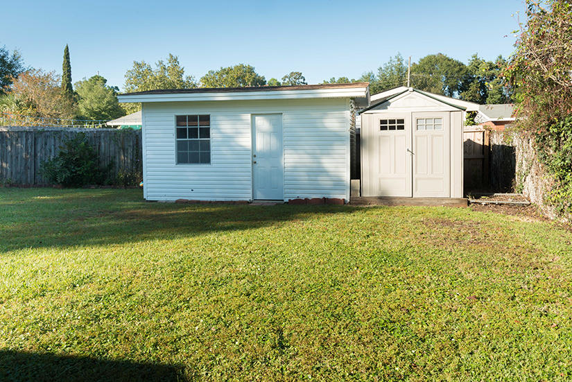 611 Lang Road Fort Walton Beach, FL 32547 - Photo 23 of 26 a front view of a house with yard