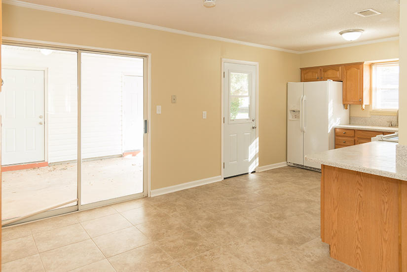 611 Lang Road Fort Walton Beach, FL 32547 - Photo 4 of 26 a view of an empty room with a window