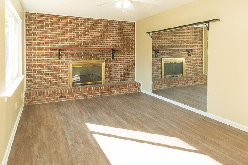 611 Lang Road Fort Walton Beach, FL 32547 - Photo 5 of 26 a view of a livingroom with wooden floor