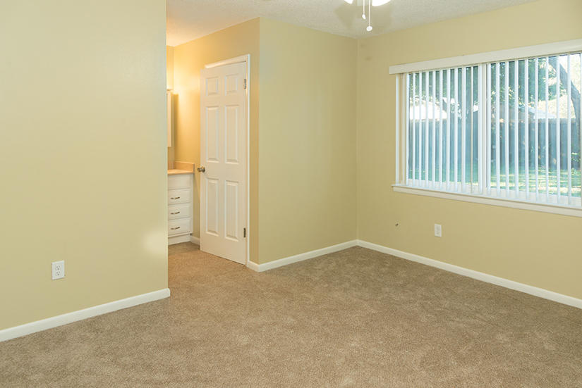 611 Lang Road Fort Walton Beach, FL 32547 - Photo 9 of 26 an empty room with windows