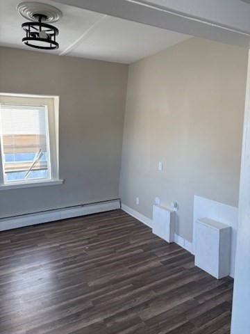 58 Bridge Street, Unit 2M Salem, MA 01970 - Photo 2 of 11 a view of empty room with wooden floor and fan