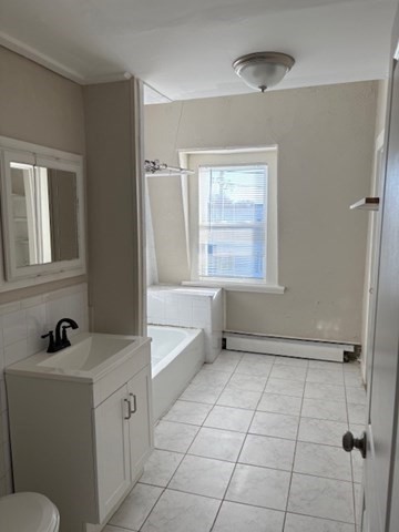 58 Bridge Street, Unit 2M Salem, MA 01970 - Photo 6 of 11 a bathroom with a sink toilet and shower