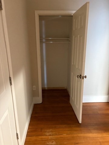 58 Bridge Street, Unit 2M Salem, MA 01970 - Photo 10 of 11 a view of a hallway with wooden floor and entryway