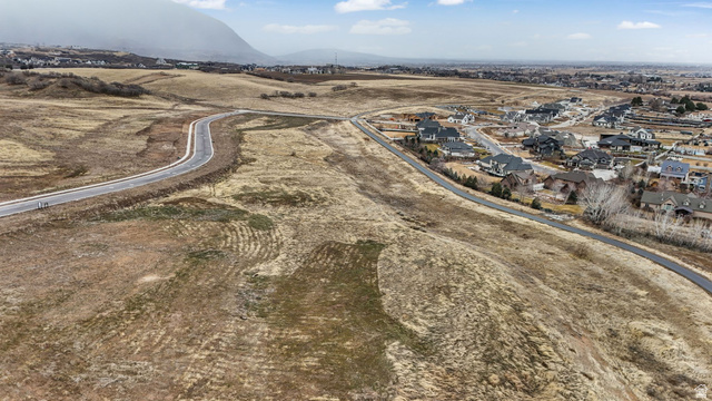 2116 South Valley View Drive, Unit 58 Mapleton, UT 84664 - Photo 10 of 13 View of property location featuring a mountainous background and nearby suburban area