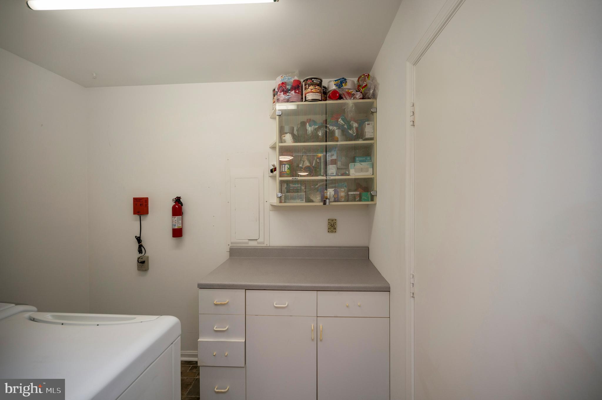 679 Cropp Road Fredericksburg, VA 22406 - Photo 28 of 39 a bathroom with a sink and cabinets