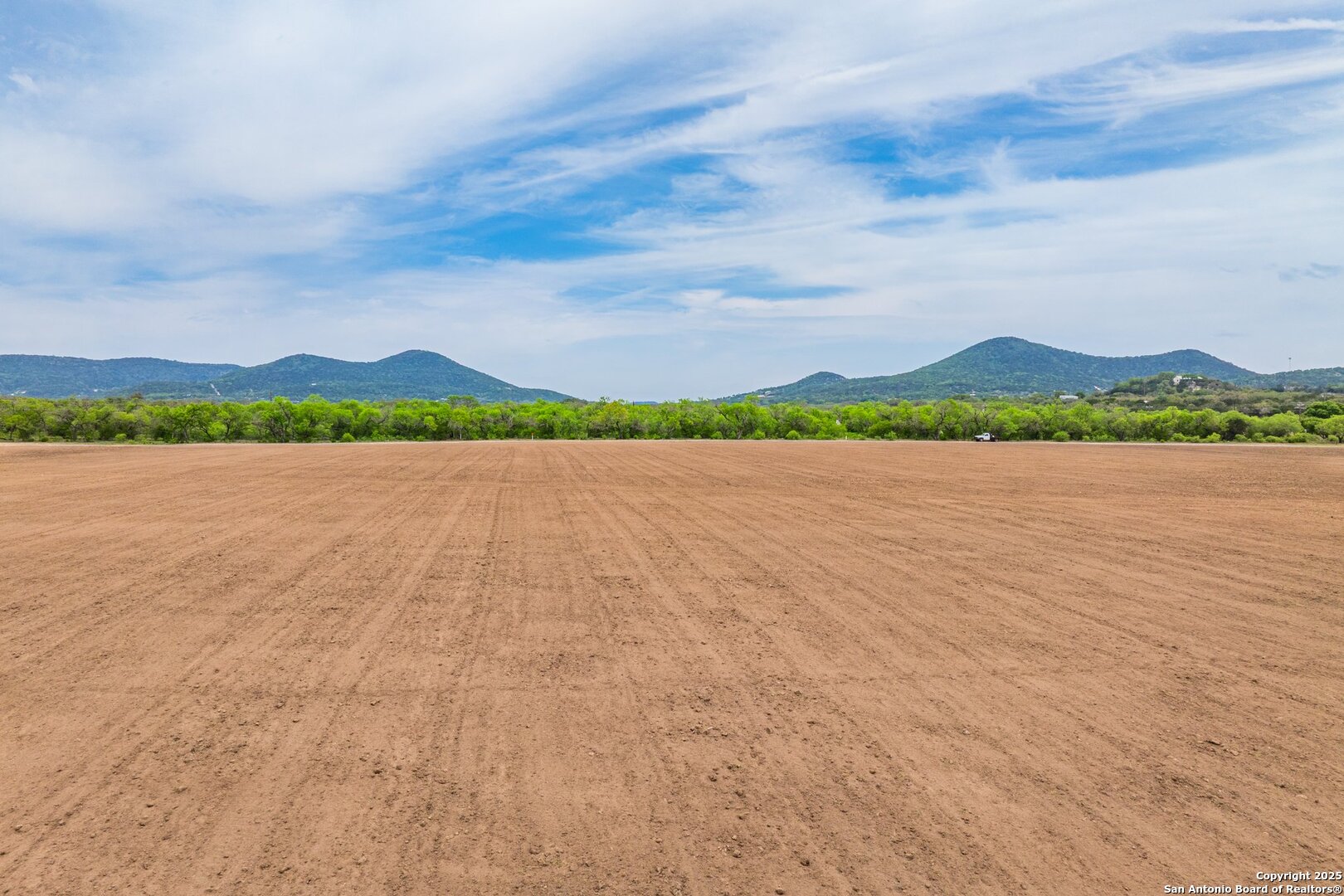 1065 B & R Utopia, TX 78884 - Photo 14 of 28 a view of lake with mountain in background