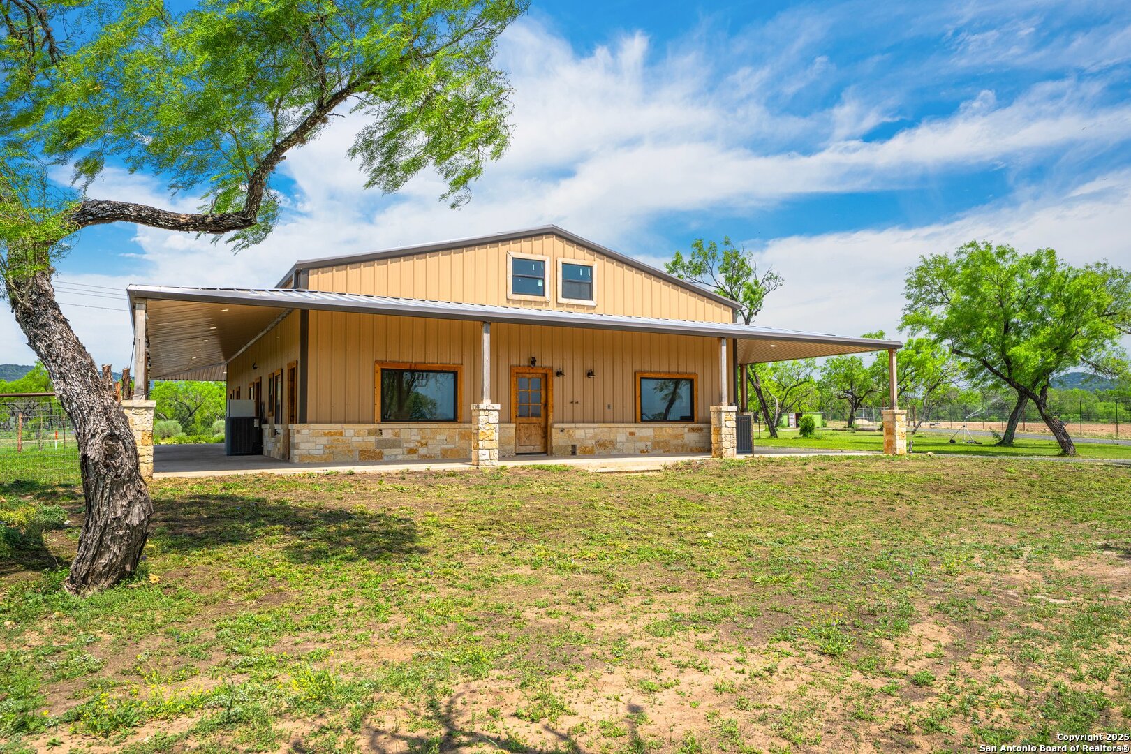1065 B & R Utopia, TX 78884 - Photo 15 of 28 a front view of house with yard and green space