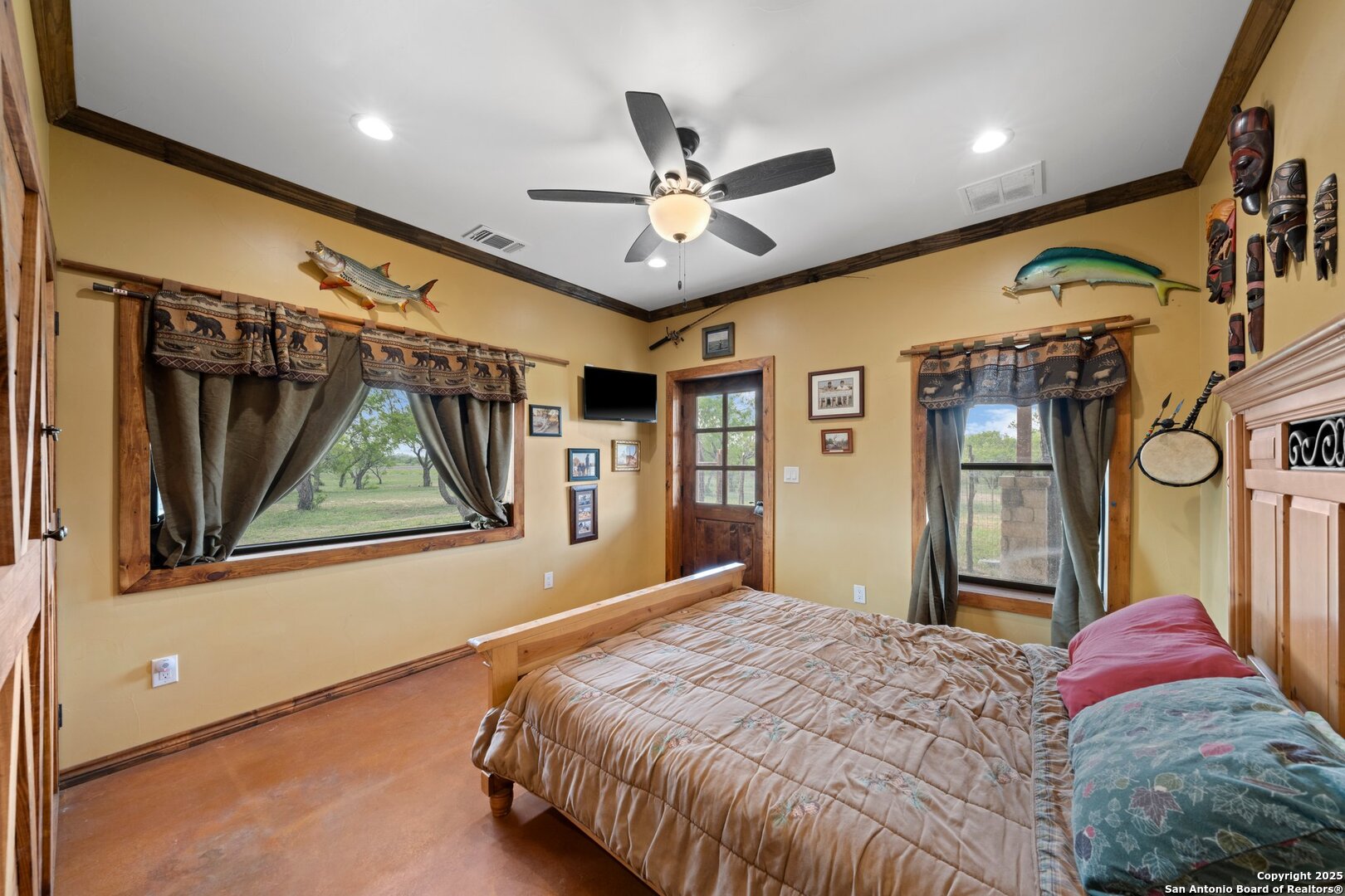1065 B & R Utopia, TX 78884 - Photo 21 of 28 a bedroom with a bed and a window