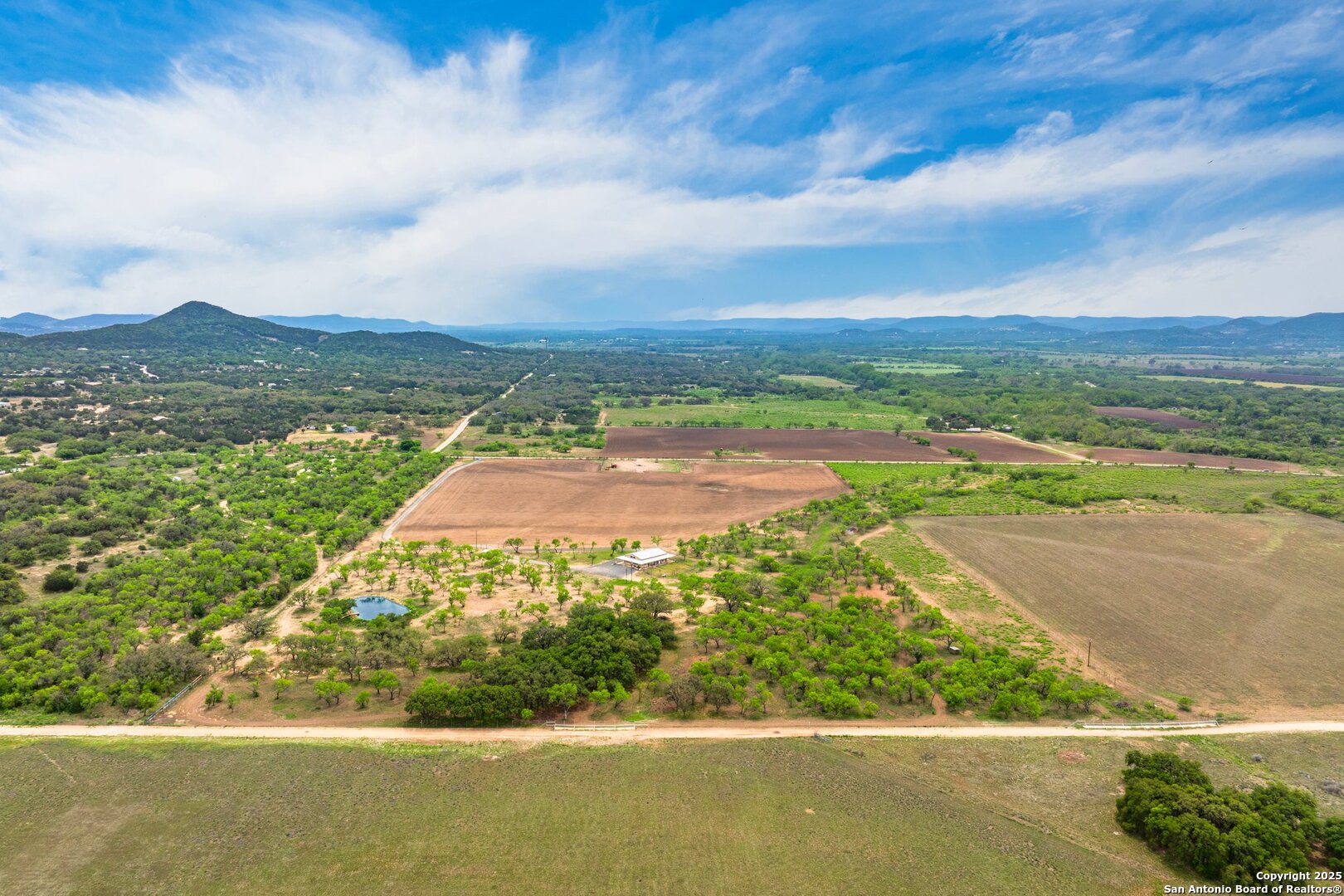 1065 B & R Utopia, TX 78884 - Photo 8 of 28 a view of a lake with a mountain