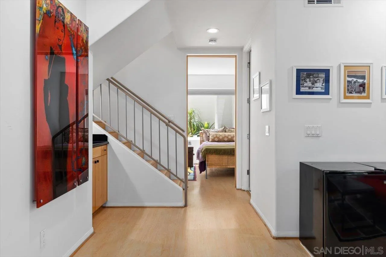 155 Sherrie Lane Del Mar, CA 92014 - Photo 11 of 38 a view of entryway and hall with wooden floor