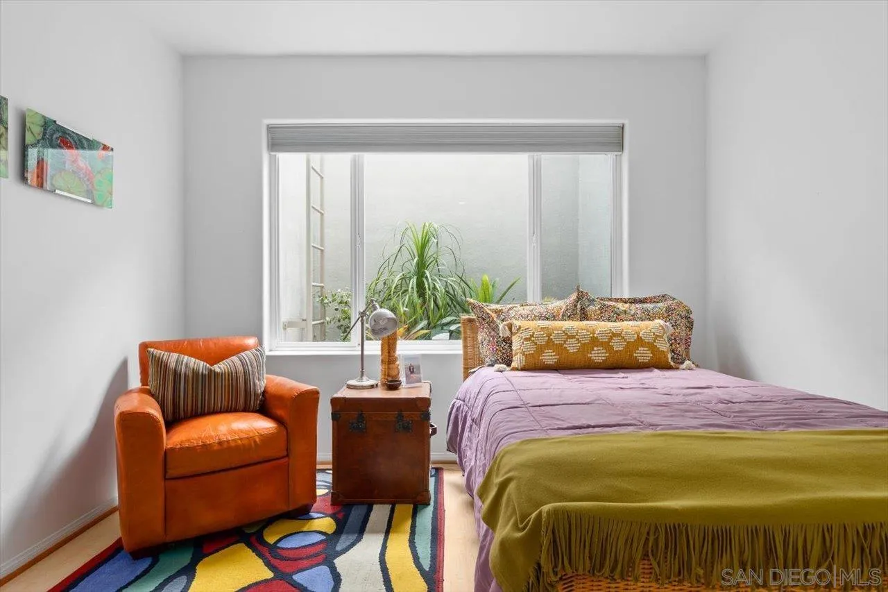 155 Sherrie Lane Del Mar, CA 92014 - Photo 19 of 38 a bedroom with a bed and a couch