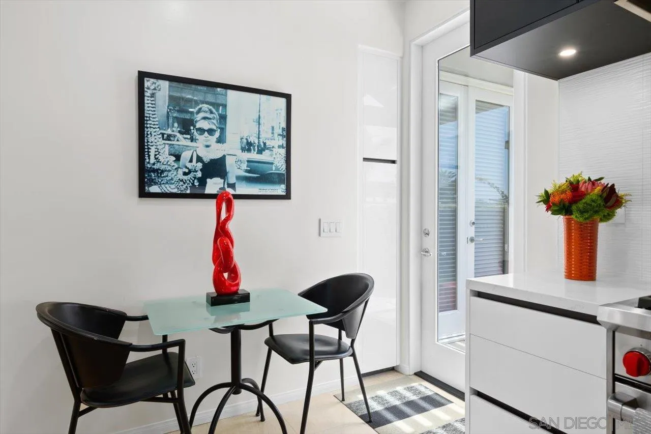 155 Sherrie Lane Del Mar, CA 92014 - Photo 20 of 38 a view of a dining room with furniture and wooden floor