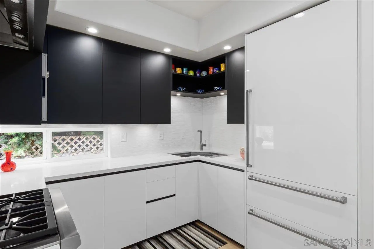 155 Sherrie Lane Del Mar, CA 92014 - Photo 22 of 38 a bathroom with a sink and a mirror