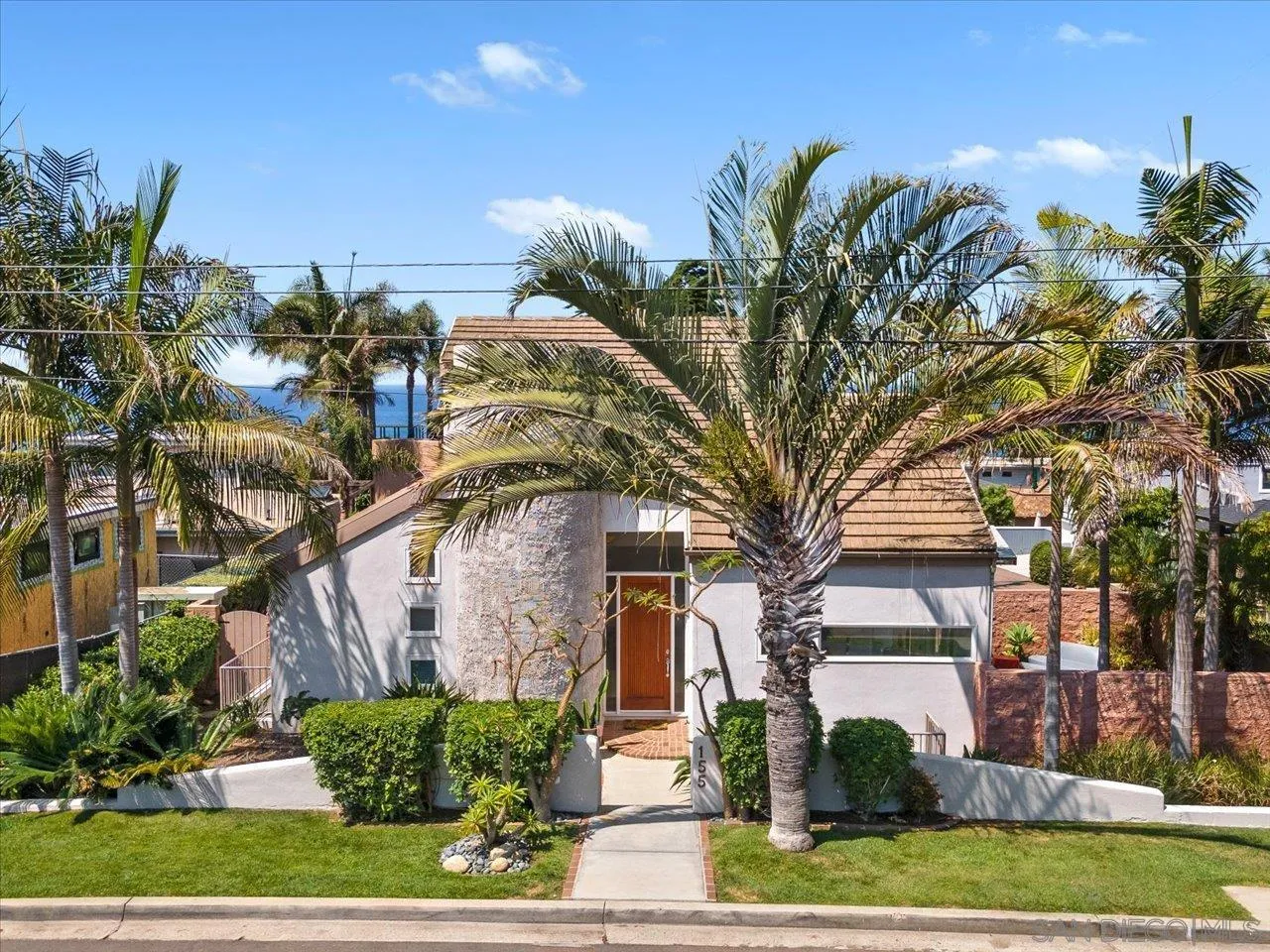 155 Sherrie Lane Del Mar, CA 92014 - Photo 33 of 38 a front view of a house with garden