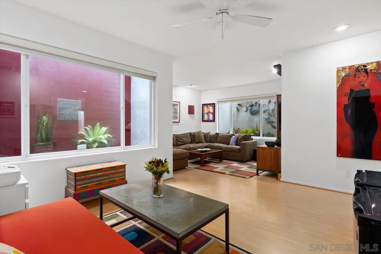 155 Sherrie Lane Del Mar, CA 92014 - Photo 8 of 38 a living room with furniture a flat screen tv and a window