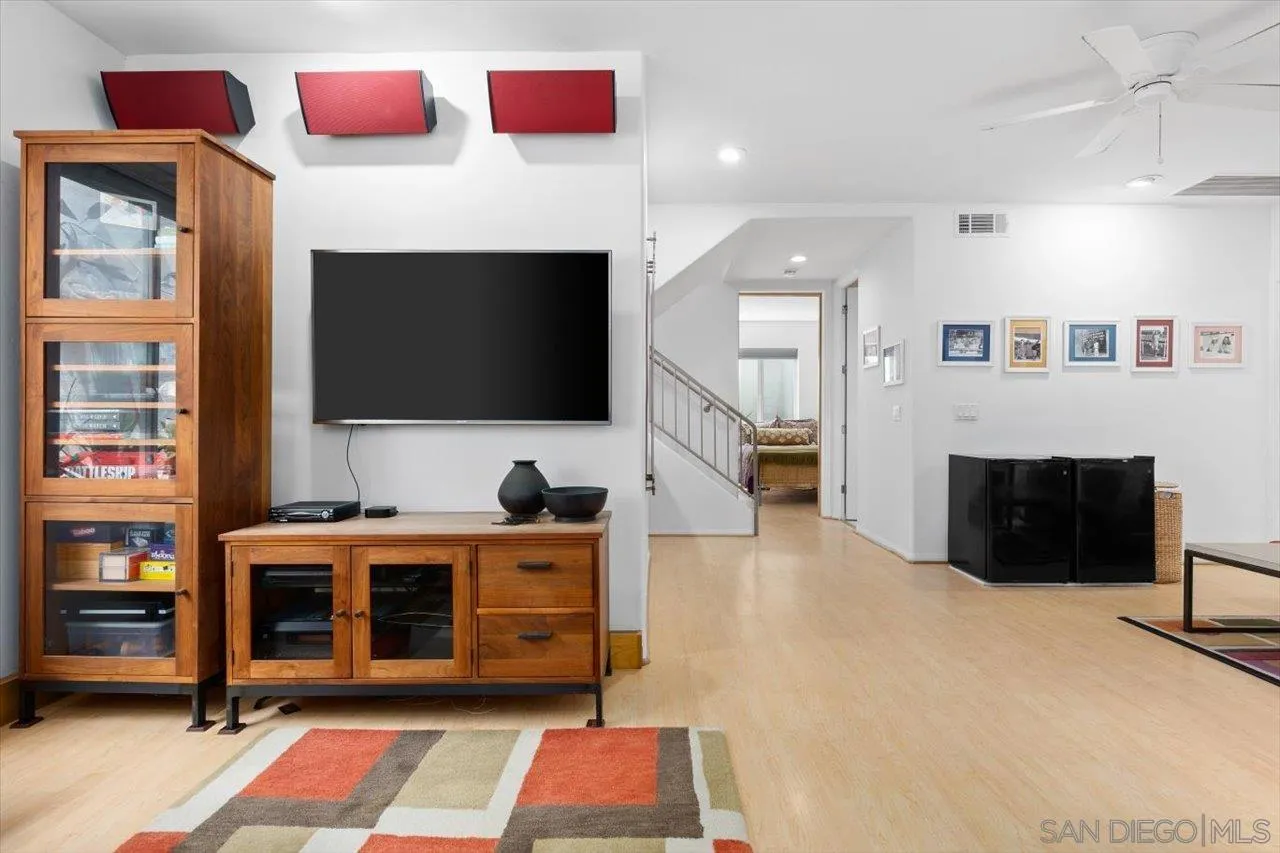 155 Sherrie Lane Del Mar, CA 92014 - Photo 10 of 38 a living room with furniture and a flat screen tv