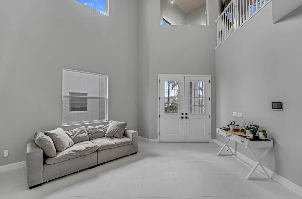 5482 Macoon Way Westlake, FL 33470 - Photo 4 of 69 a living room with furniture and window