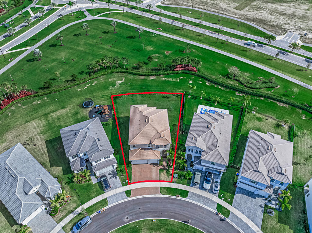 5482 Macoon Way Westlake, FL 33470 - Photo 67 of 69 an aerial view of a house with a garden and plants