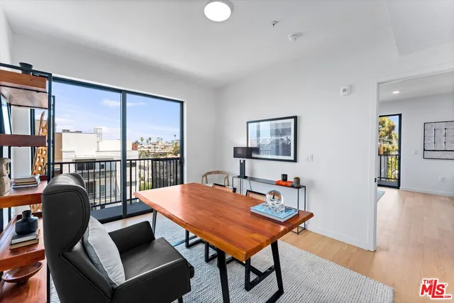 a view of a livingroom with furniture and window