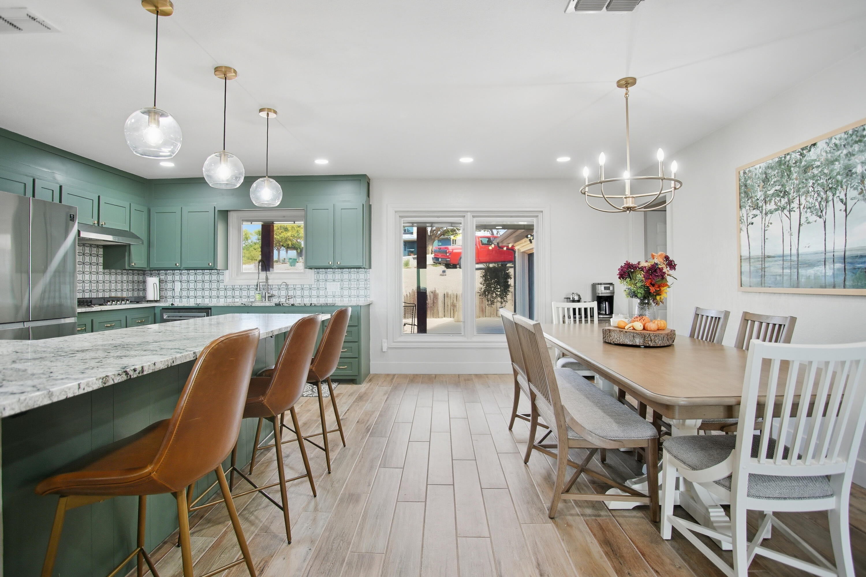 25 East Canyonview Drive Ransom Canyon, TX 79366 - Photo 13 of 58 a view of a dining room with furniture and wooden floor