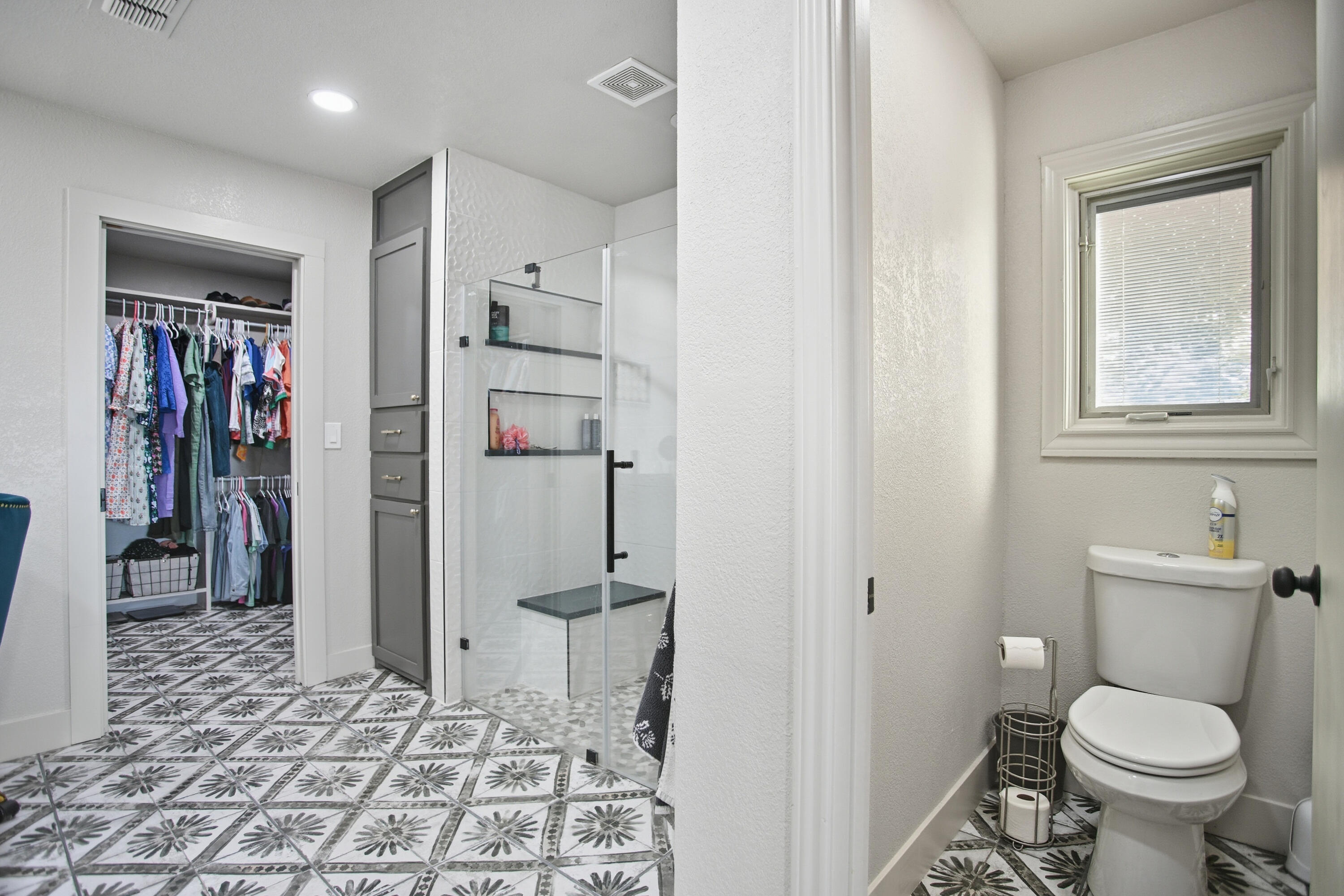 25 East Canyonview Drive Ransom Canyon, TX 79366 - Photo 24 of 58 a bathroom with a toilet and a shower
