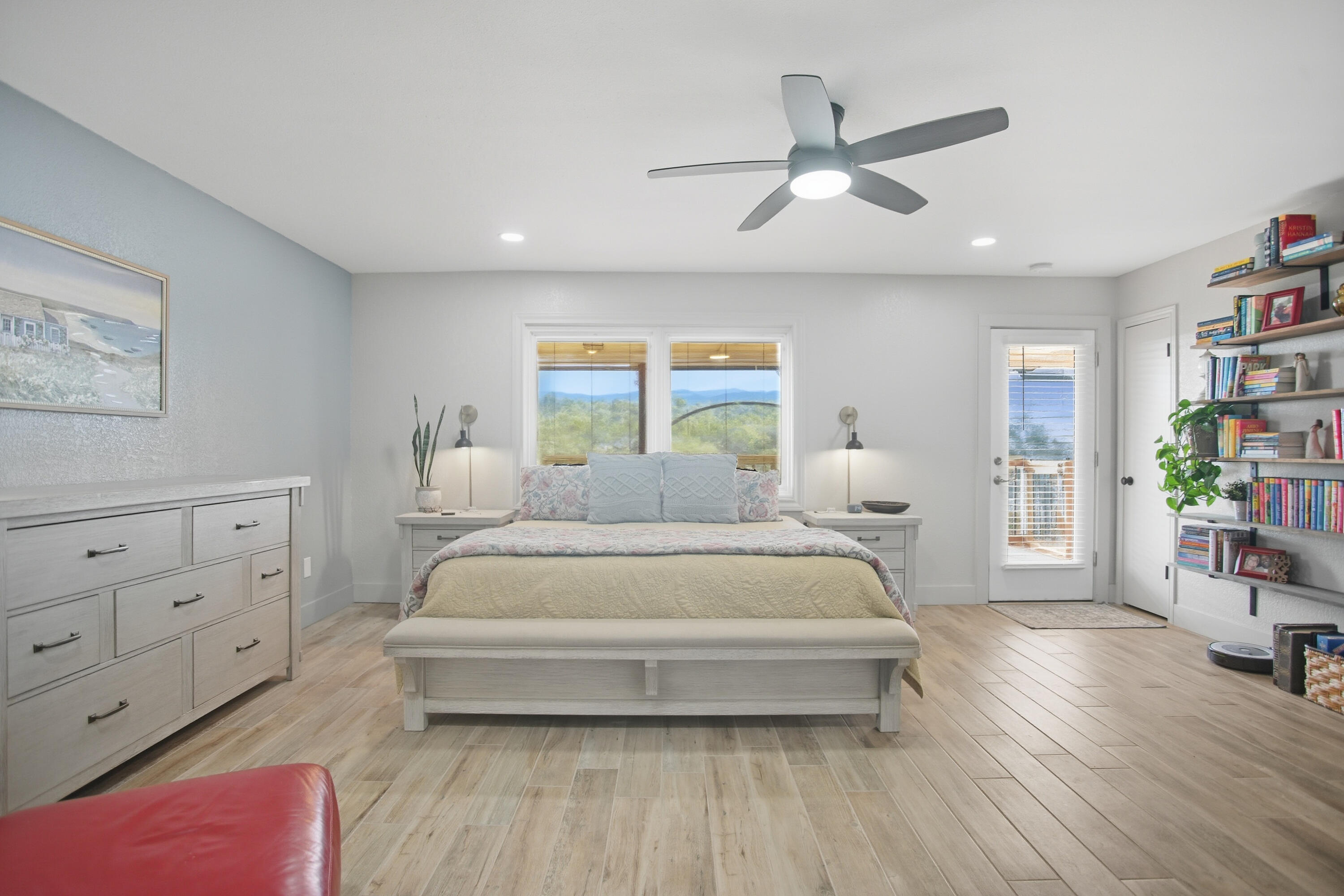 25 East Canyonview Drive Ransom Canyon, TX 79366 - Photo 29 of 58 a spacious bedroom with a bed and a book shelf